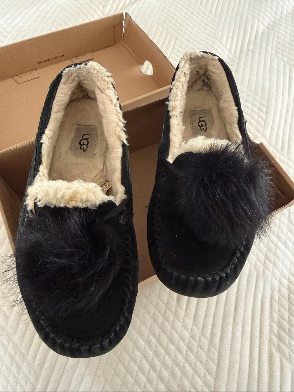 UGG Black Suede Pom Pom Shearling Moccasins